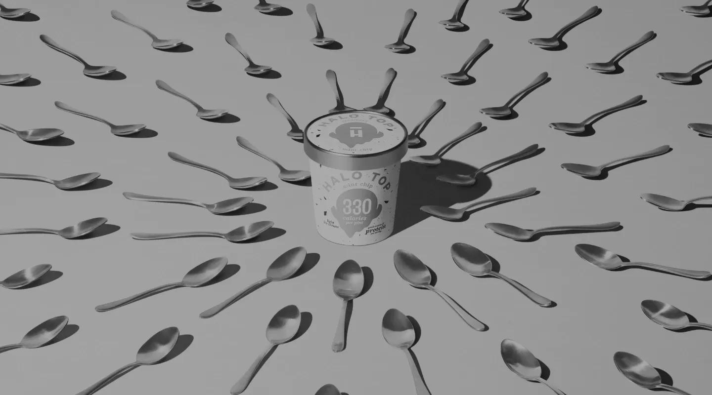 Halo Top Pint surrounded by spoons.