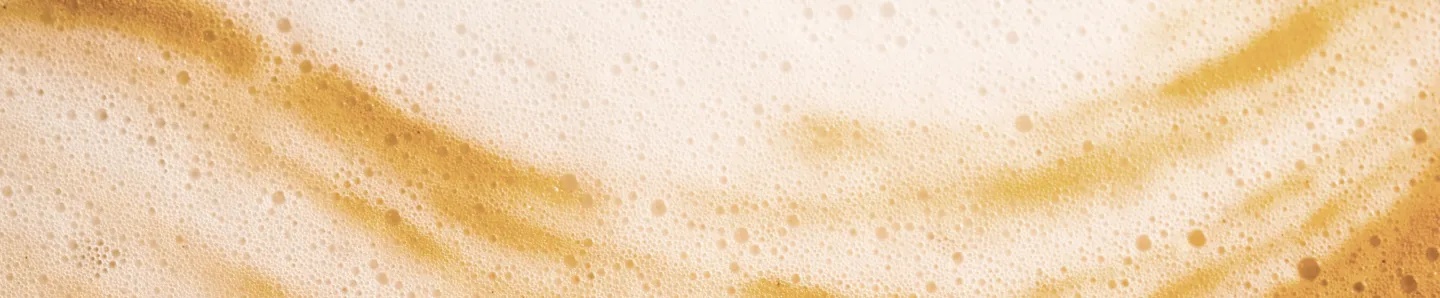 DLG-hero-bg-desktop.webp Coffee foam texture.