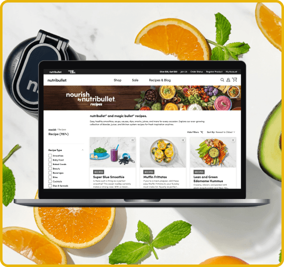 nourish-carousel-a.png Laptop displaying the nourish site with orange slices in the background.